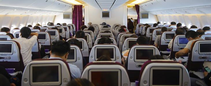 The inside of a fully seated airplane
