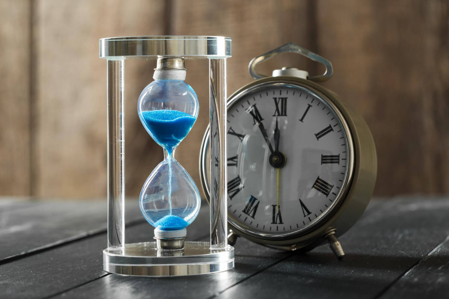 an hourglass and clock representing time running out on the statute of limitations