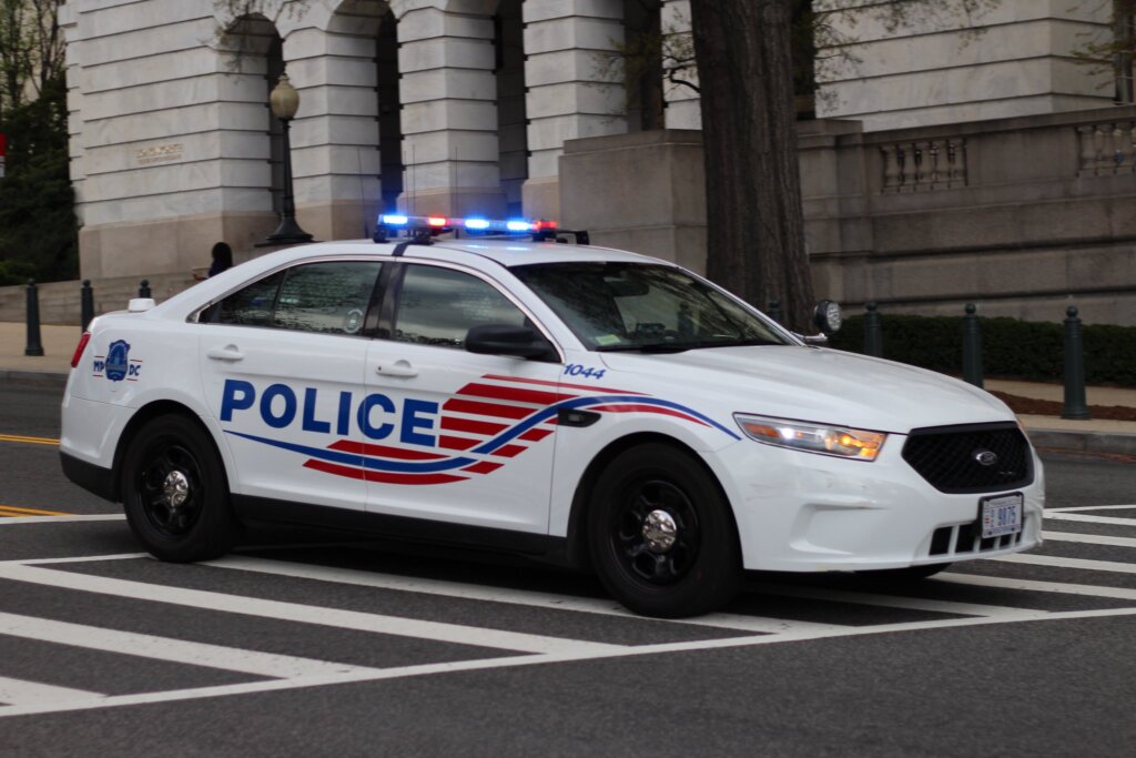 washington dc police car driving down city street
