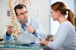 Physician explaining a spinal cord injury