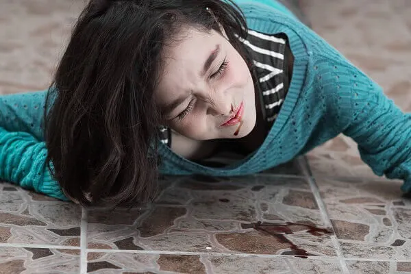 Woman injured after a slip and fall while pregnant.