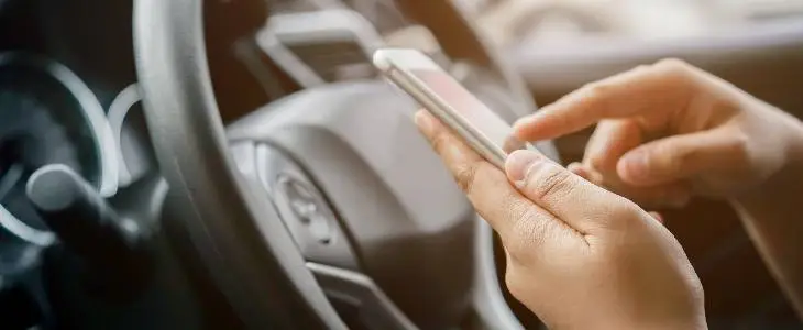 person using ridesharing app in Suburban Maryland